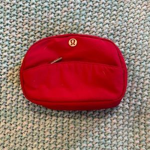 RED LULULEMON COSMETIC BAG